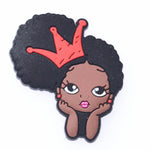 Black girl with Afro and red crown croc charm