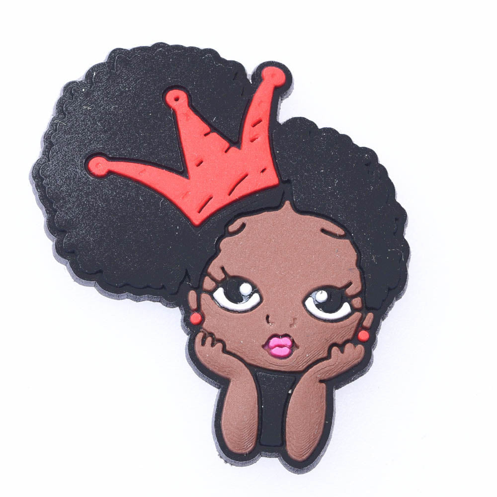 Black girl with Afro and red crown croc charm