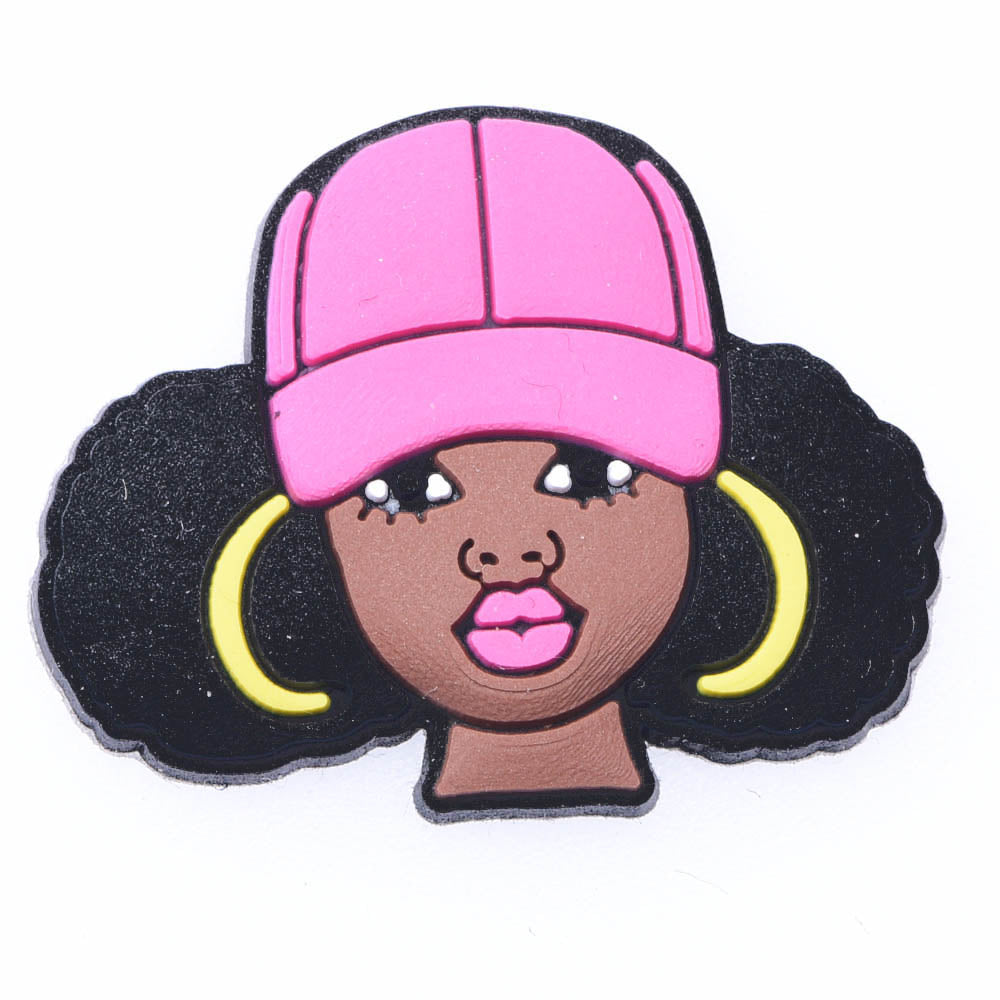 Black girl with Afro puffs Croc charms